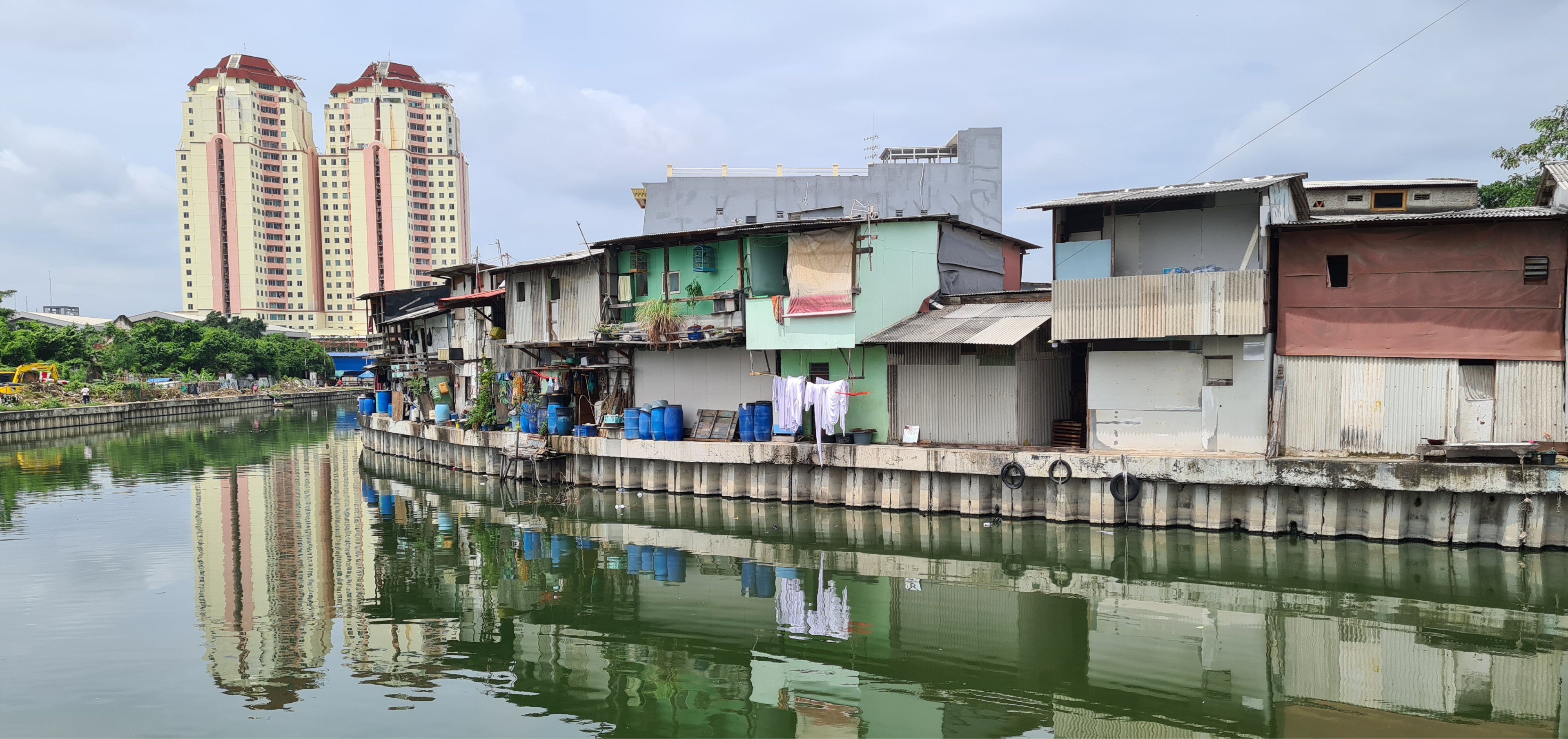Simple houses along the canal in Jakarta