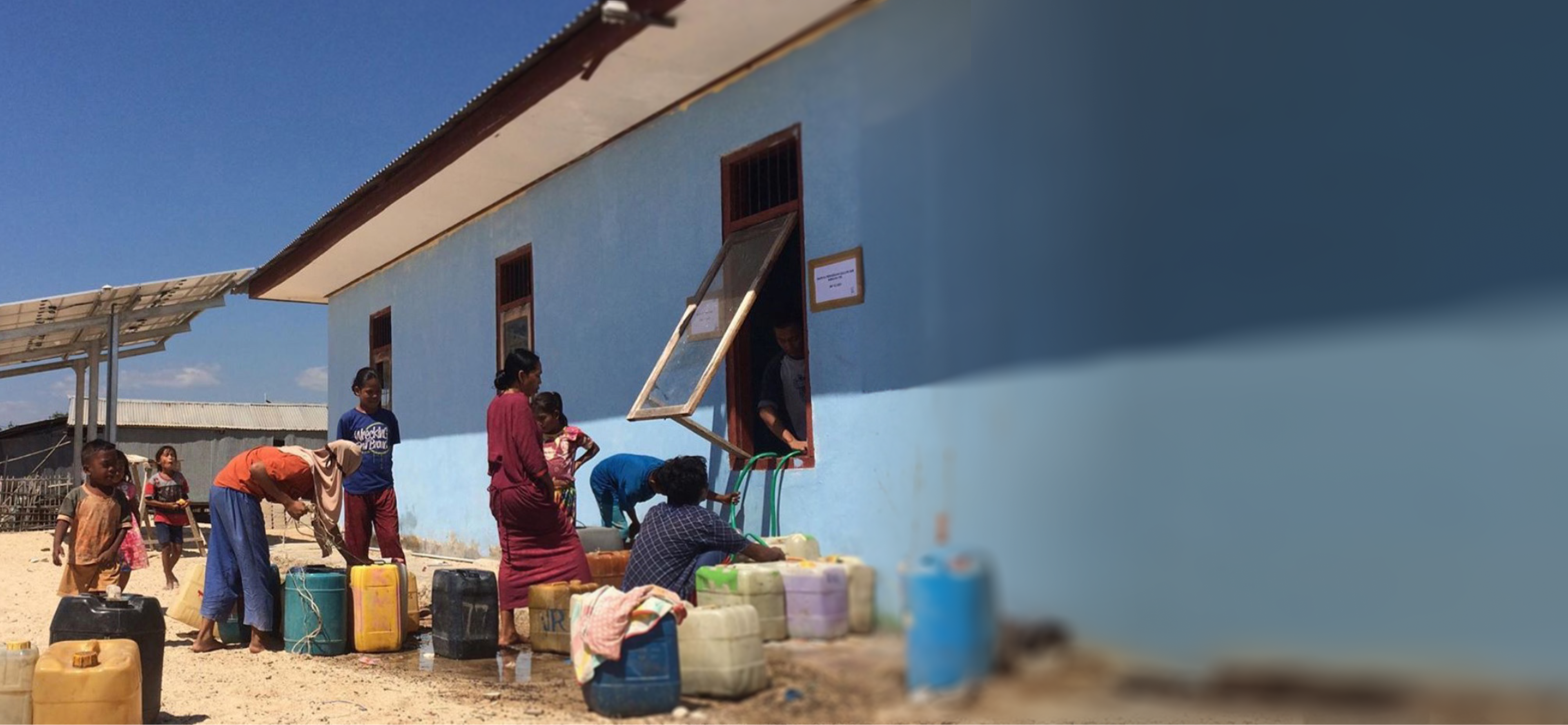 Locals filling up water containers